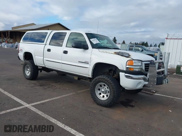 2005 GMC Sierra 2500HD SLE z VIN 1GTHK23245F887905, wystawiony jako IAAI lot #41680146 z przebiegiem 104 775 mil mil oraz . Historia ofert i sprzedaży dostępna na DreamBid. Obrazek 1.