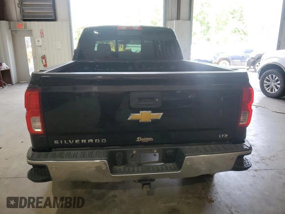 2017 Chevrolet Silverado 1500 LTZ with VIN 3GCPCSEC9HG339738, listed as a Copart auction lot 53599595 with 220,488 mi miles and Salvage Title. Bid and sale history available at DreamBid. Image 6.