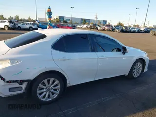 2020 Toyota Camry LE with VIN 4T1C11AK3LU882824, listed as a IAAI auction lot 41765544 with 48,209 mi miles and . Bid and sale history available at carsss.com. Image 14.
