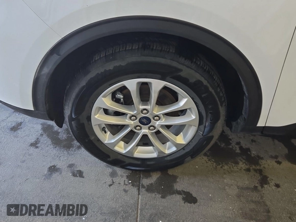 2020 Ford Escape SE with VIN 1FMCU9G63LUB82205, listed as a IAAI auction lot 42663574 with 91,305 mi miles and . Bid and sale history available at DreamBid. Image 36.