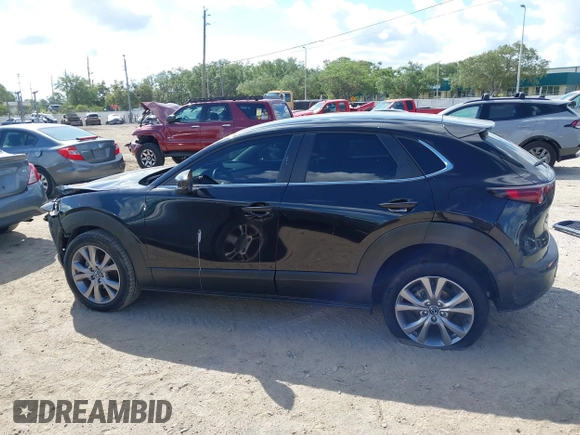 2021 Mazda CX-30 Select z VIN 3MVDMABL1MM251761, wystawiony jako IAAI lot #42267217 z przebiegiem 42 617 mil mil oraz . Historia ofert i sprzedaży dostępna na DreamBid. Obrazek 13.