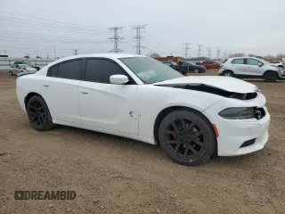 2020 Dodge Charger SXT with VIN 2C3CDXBG9LH111025, listed as a Copart auction lot 53455485 with 57,964 mi miles and Salvage title. Bid and sale history available at DreamBid. Image 4.