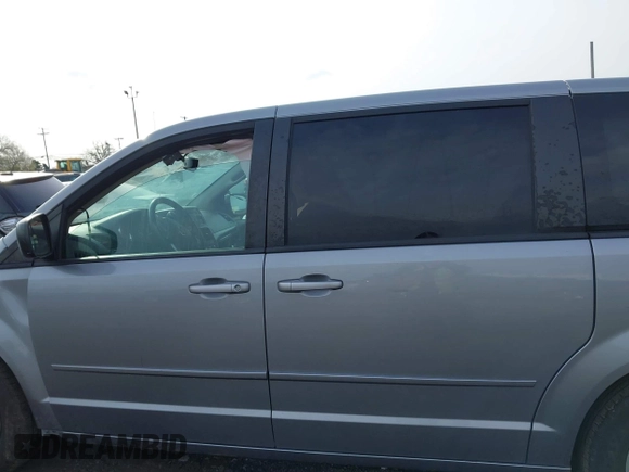 2015 Dodge Grand Caravan SE with VIN 2C4RDGBG8FR612296, listed as a IAAI auction lot 42112920 with 137,023 mi miles and . Bid and sale history available at DreamBid. Image 14.