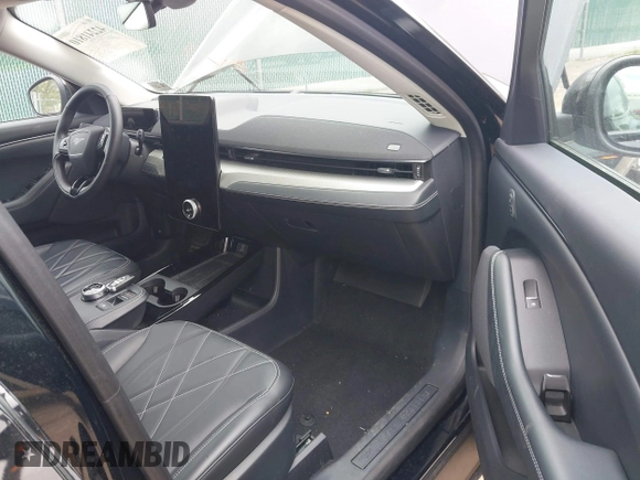 2021 Ford Mustang Mach-E Select with VIN 3FMTK1SS4MMA21329, listed as a IAAI auction lot 42241810 with 35,700 mi miles and . Bid and sale history available at DreamBid. Image 5.