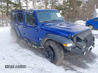 2018 Jeep Wrangler Unlimited Sport S with VIN 1C4HJXDNXJW265764, listed as a IAAI auction lot 41359018 with 50,941 mi miles and . Bid and sale history available at DreamBid. Image 1.