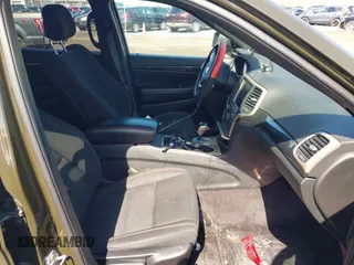 2016 Jeep Grand Cherokee Laredo z VIN 1C4RJFAG2GC454861, wystawiony jako IAAI lot #41964977 z przebiegiem 180 592 mil mil oraz . Historia ofert i sprzedaży dostępna na DreamBid. Obrazek 5.