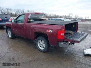 2013 Chevrolet Silverado 1500 LT with VIN 1GCNKSE01DZ168655, listed as a IAAI auction lot 41488652 with 102,224 mi miles. Bid and sale history available at carsss.com. Image 3.