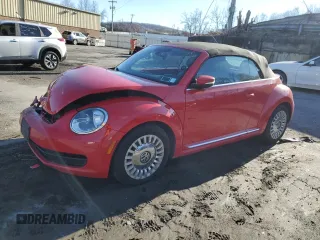 2016 Volkswagen Beetle S with VIN 3VW517AT7GM809987, listed as a Copart auction lot 83867224 with 164,184 mi miles and Salvage Title. Bid and sale history available at DreamBid. Image 1.