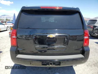 2015 Chevrolet Tahoe LT with VIN 1GNSCBKC6FR297726, listed as a Copart auction lot 55097475 with 114,471 mi miles and Salvage title. Bid and sale history available at DreamBid. Image 6.