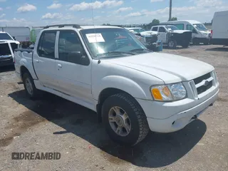 2004 Ford Explorer Sport Trac XLS z VIN 1FMZU77K14UB90445, wystawiony jako IAAI lot #42556714 z przebiegiem 217 850 mil mil oraz . Historia ofert i sprzedaży dostępna na DreamBid. Obrazek 1.