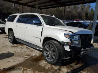 2020 Chevrolet Suburban Premier with VIN 1GNSKJKC0LR276184, listed as a Copart auction lot 88840565 with 87,563 mi miles and Salvage Title. Bid and sale history available at carsss.com. Image 4.