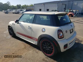 2012 MINI Hardtop with VIN WMWSU3C53CT369974, listed as a Copart auction lot 53238895 with 130,734 mi miles and Salvage Title. Bid and sale history available at DreamBid. Image 2.