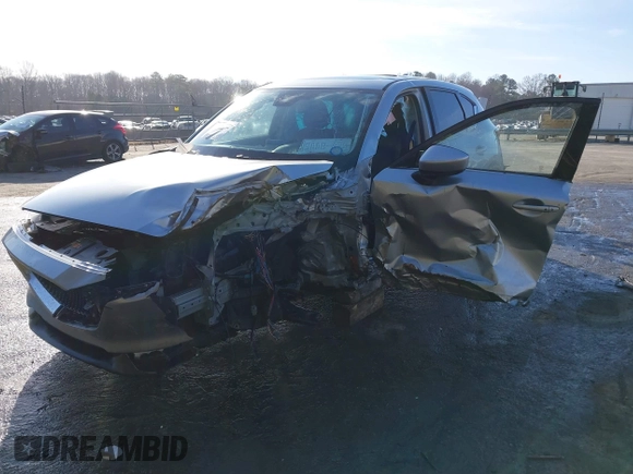 2020 Mazda CX-5 Grand Touring z VIN JM3KFADM0L0738337, wystawiony jako IAAI lot #41485078 z przebiegiem Nie podano mil oraz . Historia ofert i sprzedaży dostępna na DreamBid. Obrazek 17.