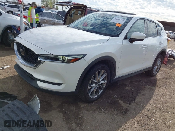 2019 Mazda CX-5 Grand Touring with VIN JM3KFBDM8K0518576, listed as a IAAI auction lot 41854296 with 88,706 mi miles and . Bid and sale history available at carsss.com. Image 2.