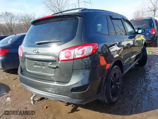 2010 Hyundai Santa Fe SE with VIN 5NMSH4AG1AH362165, listed as a IAAI auction lot 41534359 with 132,926 mi miles. Bid and sale history available at carsss.com. Image 4.