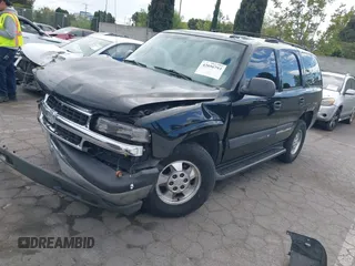 2005 Chevrolet Tahoe Z71 with VIN 1GNEC13TX5R145310, listed as a IAAI auction lot 42056793 with 159,002 mi miles and . Bid and sale history available at DreamBid. Image 2.
