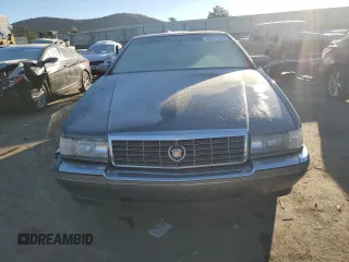 1993 Cadillac Eldorado z VIN 1G6EL12B1PU616913, wystawiony jako Copart lot #80311794 z przebiegiem 174 556 mil mil oraz Szkoda całkowita • Salvage title. Historia ofert i sprzedaży dostępna na DreamBid. Obrazek 5.