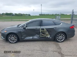 2017 Ford Fusion Energi SE with VIN 3FA6P0PU9HR227932, listed as a IAAI auction lot 42177500 with 106,938 mi miles. Bid and sale history available at carsss.com. Image 14.