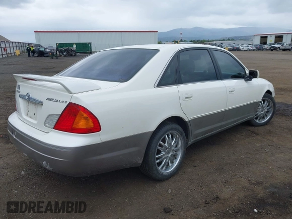 2000 Toyota Avalon XL z VIN 4T1BF28B9YU040456, wystawiony jako IAAI lot #42310333 z przebiegiem 201 596 mil mil oraz . Historia ofert i sprzedaży dostępna na DreamBid. Obrazek 4.