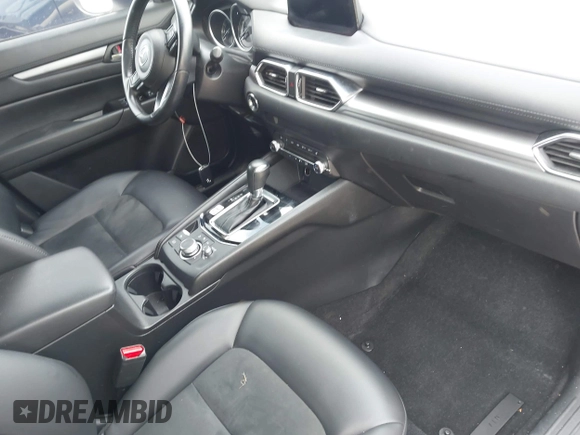 2020 Mazda CX-5 Touring z VIN JM3KFBCM2L0786784, wystawiony jako IAAI lot #42127457 z przebiegiem 62 665 mil mil oraz . Historia ofert i sprzedaży dostępna na DreamBid. Obrazek 5.