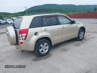 2006 Suzuki Grand Vitara XSport z VIN JS3TD944064102663, wystawiony jako IAAI lot #42489072 z przebiegiem 128 759 mil mil oraz . Historia ofert i sprzedaży dostępna na DreamBid. Obrazek 4.