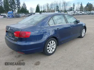 2013 Volkswagen Jetta Sedan SE w/Convenience/Sunroof with VIN 3VWDP7AJ7DM370519, listed as a IAAI auction lot 41896810 with 140,767 mi miles. Bid and sale history available at carsss.com. Image 4.