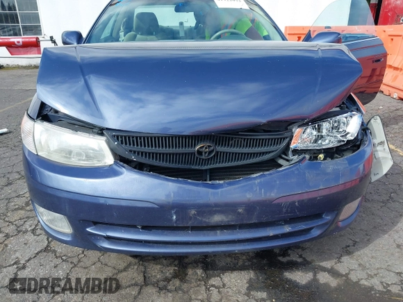 1999 Toyota Solara SE with VIN 2T1CF22P5XC163759, listed as a IAAI auction lot 41922973 with 146,042 mi miles. Bid and sale history available at carsss.com. Image 6.