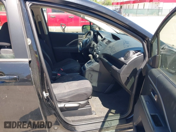 2012 Mazda 5 Sport with VIN JM1CW2BLXC0128507, listed as a IAAI auction lot 42145486 with 175,494 mi miles. Bid and sale history available at carsss.com. Image 5.