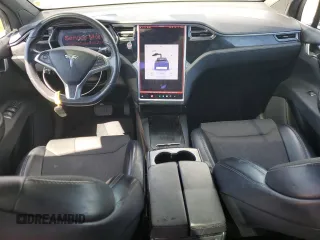 2017 Tesla Model X 90D with VIN 5YJXCBE20HF051099, listed as a Copart auction lot 52208205 with 118,828 mi miles and Salvage Title. Bid and sale history available at DreamBid. Image 8.