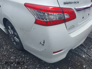 2014 Nissan Sentra SR z VIN 3N1AB7AP2EL640016, wystawiony jako IAAI lot #42253092 z przebiegiem 105 760 mil mil oraz . Historia ofert i sprzedaży dostępna na DreamBid. Obrazek 12.