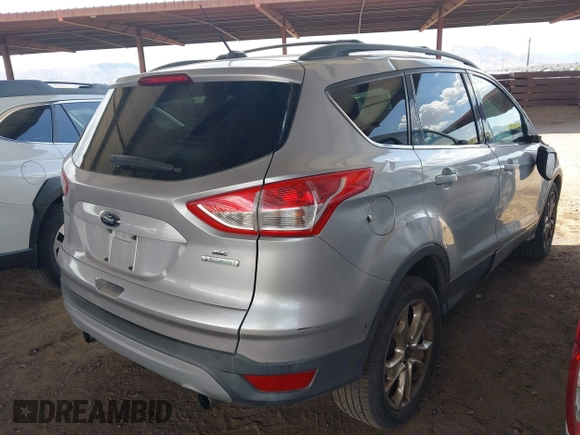 2013 Ford Escape SE with VIN 1FMCU0GX9DUB83512, listed as a IAAI auction lot 41970256 with 69,897 mi miles and . Bid and sale history available at DreamBid. Image 4.