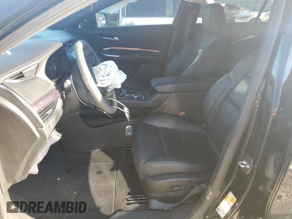2022 Cadillac XT4 FWD Luxury with VIN 1GYAZAR45NF136810, listed as a Copart auction lot 74359664 with 10,552 mi miles and Salvage title. Bid and sale history available at DreamBid. Image 7.