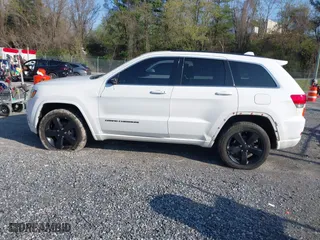 2015 Jeep Grand Cherokee Altitude with VIN 1C4RJFAG1FC797157, listed as a IAAI auction lot 42021139 with 148,491 mi miles. Bid and sale history available at carsss.com. Image 14.