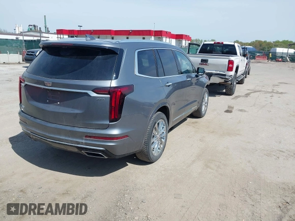 2022 Cadillac XT6 Premium Luxury with VIN 1GYKPFRS6NZ110074, listed as a IAAI auction lot 42060276 with 43,760 mi miles. Bid and sale history available at carsss.com. Image 4.