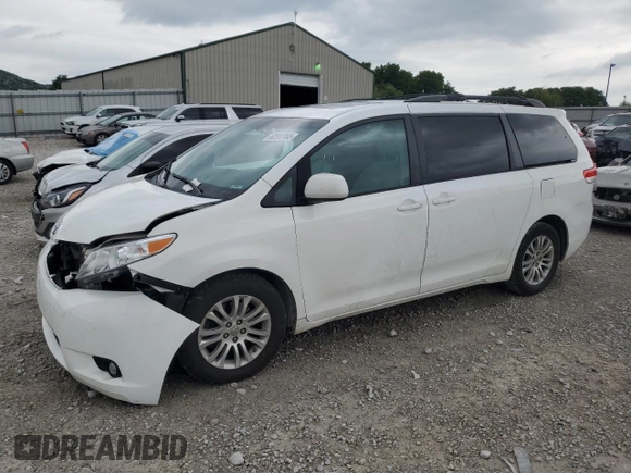 2012 Toyota Sienna XLE AAS with VIN 5TDYK3DC0CS212613, listed as a Copart auction lot 62317765 with 258,124 mi miles and Salvage title. Bid and sale history available at DreamBid. Image 1.