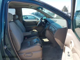 1998 Toyota Sienna LE with VIN 4T3ZF13CXWU023663, listed as a IAAI auction lot 42011727 with 214,972 mi miles. Bid and sale history available at carsss.com. Image 5.