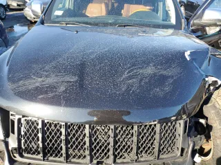 2013 Jeep Grand Cherokee Overland with VIN 1C4RJFCTXDC525097, listed as a Copart auction lot 42250875 with 214,368 mi miles and Salvage Title. Bid and sale history available at carsss.com. Image 12.