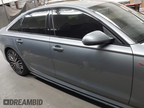 2017 Audi A6 Premium Plus z VIN WAUF2AFC9HN128728, wystawiony jako IAAI lot #41699063 z przebiegiem 110 475 mil mil oraz . Historia ofert i sprzedaży dostępna na DreamBid. Obrazek 13.