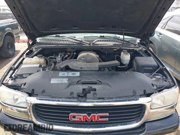 2005 GMC Yukon SLT with VIN 1GKEK13TX5R274020, listed as a IAAI auction lot 41889445 with 209,132 mi miles. Bid and sale history available at carsss.com. Image 10.