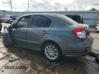 2008 Suzuki SX4 Convenience with VIN JS2YC415285104876, listed as a Copart auction lot 48996085 with 190,953 mi miles and Salvage Title. Bid and sale history available at DreamBid. Image 2.