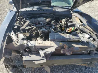 2004 Ford Mustang GT Deluxe z VIN 1FAFP42X64F137315, wystawiony jako Copart lot #52577925 z przebiegiem 210 557 mil mil oraz Szkoda całkowita • Salvage title. Historia ofert i sprzedaży dostępna na DreamBid. Obrazek 13.