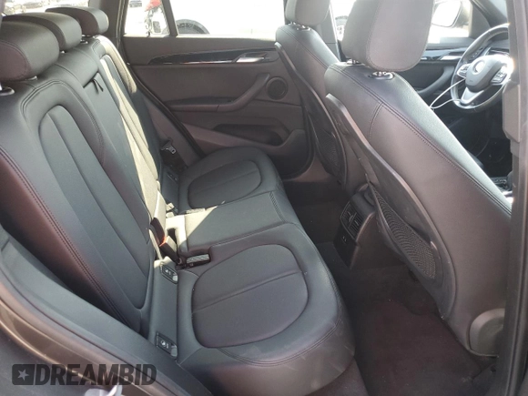 2018 BMW X1 sDrive28i with VIN WBXHU7C35J5L09783, listed as a Copart auction lot 55147935 with 37,114 mi miles and Salvage Title. Bid and sale history available at DreamBid. Image 11.