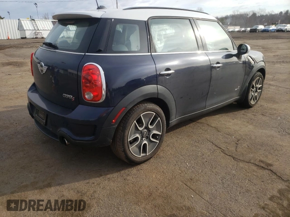 2012 MINI Countryman S with VIN WMWZC5C55CWL64092, listed as a Copart auction lot 50703855 with 69,785 mi miles and Salvage Title. Bid and sale history available at DreamBid. Image 3.