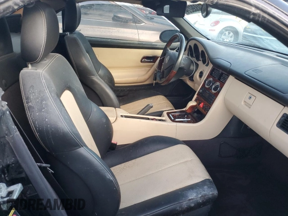 2001 Mercedes-Benz SLK-Class with VIN WDBKK65F51F217396, listed as a Copart auction lot 74339214 with 56,281 mi miles and Salvage Title. Bid and sale history available at carsss.com. Image 10.