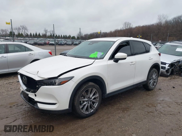 2021 Mazda CX-5 Grand Touring with VIN JM3KFADM4M1340141, listed as a IAAI auction lot 41194711 with 37,887 mi miles. Bid and sale history available at carsss.com. Image 17.