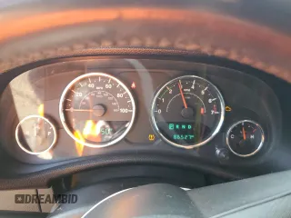 2018 Jeep Wrangler JK Unlimited Sport S with VIN 1C4HJWDGXJL855671, listed as a Copart auction lot 84122204 with 86,527 mi miles and Salvage Title. Bid and sale history available at carsss.com. Image 9.