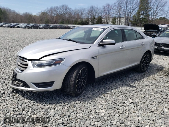 2018 Ford Taurus SEL with VIN 1FAHP2E87JG137928, listed as a Copart auction lot 53438695 with 56,874 mi miles and Salvage title. Bid and sale history available at DreamBid. Image 1.