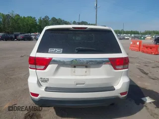 2012 Jeep Grand Cherokee Laredo with VIN 1C4RJFAG2CC176313, listed as a IAAI auction lot 42098127 with 162,556 mi miles. Bid and sale history available at carsss.com. Image 16.