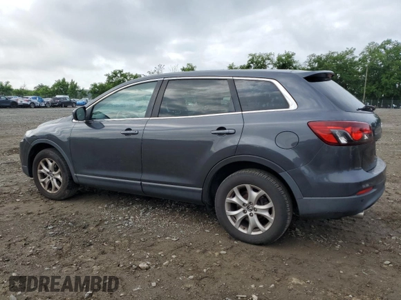 2015 Mazda CX-9 Touring z VIN JM3TB2CA2F0452202, wystawiony jako Copart lot #60407215 z przebiegiem 158 373 mil mil oraz Szkoda całkowita • Salvage title. Historia ofert i sprzedaży dostępna na DreamBid. Obrazek 2.