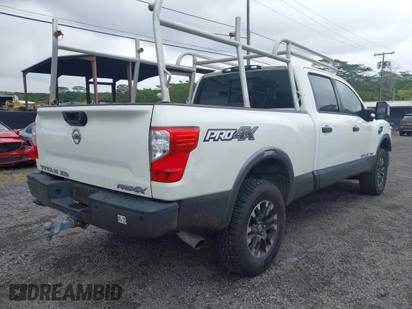 2017 Nissan Titan XD PRO-4X with VIN 1N6BA1F47HN517135, listed as a IAAI auction lot 41605323 with 108,984 mi miles. Bid and sale history available at carsss.com. Image 4.
